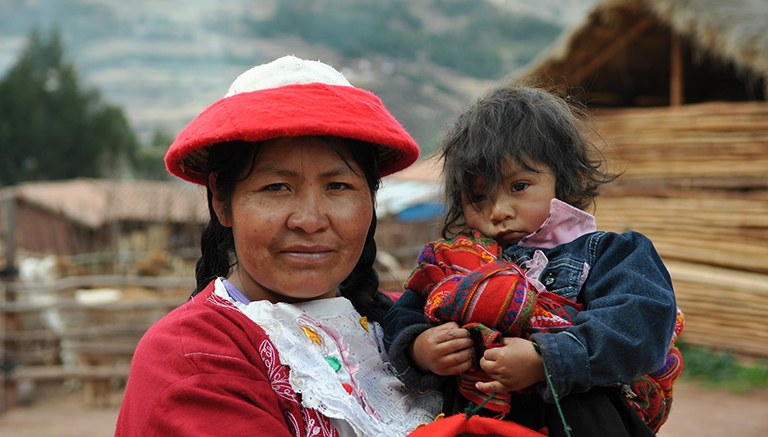 image of a woman holding a small child