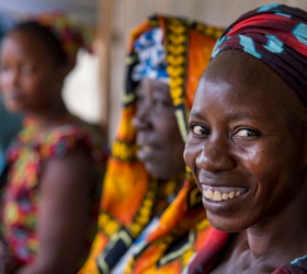 Photo showing a smiling Senegalese woman.