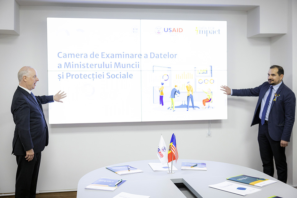 This image shows Kent D. Logsdon, US Ambassador to the Republic of Moldova (L), and Alexei Buzu, Moldova Minister of Labor and Social Protection (R), during the official launch of the second Data Review Room in Moldova on February 24, 2023.