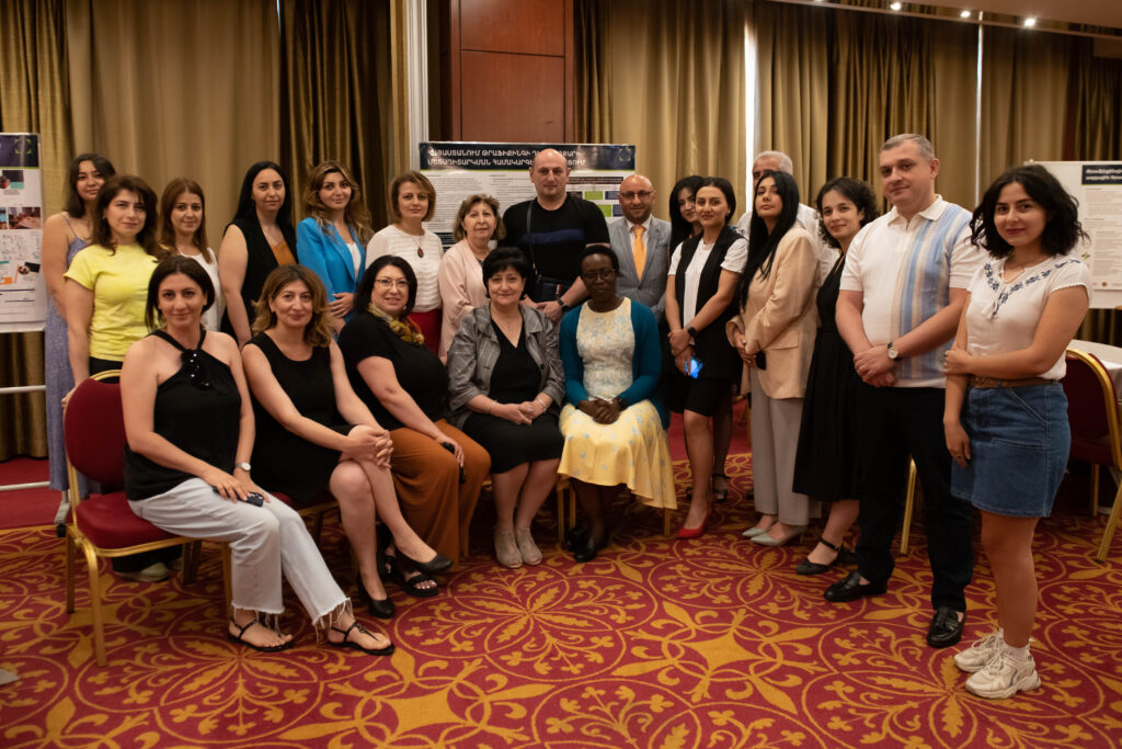 Photo showing D4I staff and event attendees gathering at the D4I close out event in Armenia.