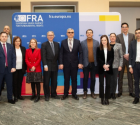 Photo showing Moldovan delegates, D4I and FRA representatives, in the FRA Atrium.